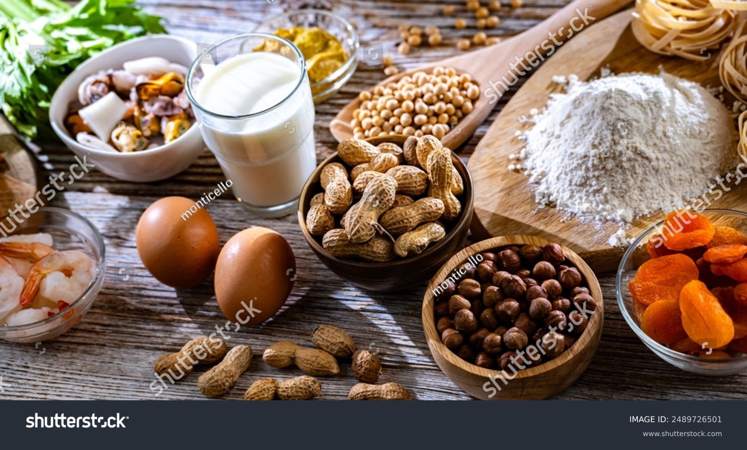 stock-photo-composition-with-common-food-allergens-including-egg-milk-soya-nuts-fish-seafood-wheat-flour-2489726501
