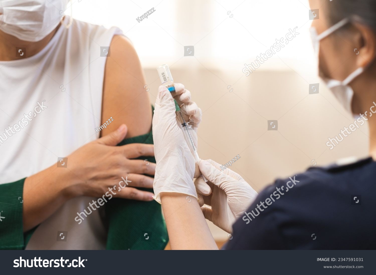 stock-photo-covid-coronavirus-elderly-asian-adult-woman-getting-vaccine-from-doctor-or-nurse-giving-shot-to-2347591031